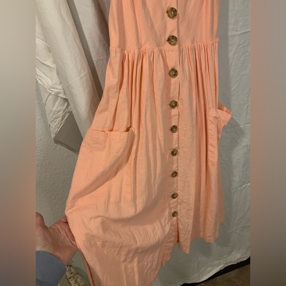 The cutest dress ever comfortable, and so flattering on! Coral pink color - Picture 3 of 4